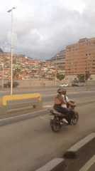 Evening drive through Caracas captures urban landscape views
