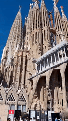 Sagrada Familia documented under clear skies, construction continues