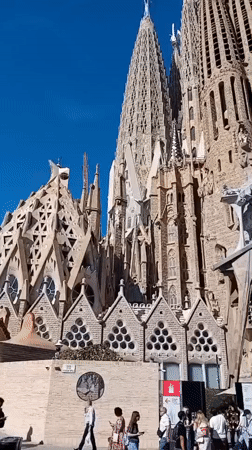 Sagrada Familia documented under clear skies, construction continues