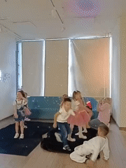 Kids dancing and playing at an indoor activity space in Samara