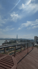 Seoul skyline documented from elevated park viewpoints near Han River