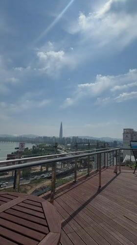 Seoul skyline documented from elevated park viewpoints near Han River