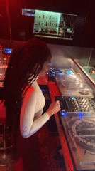 Female DJ performs at red-lit Barcelona venue