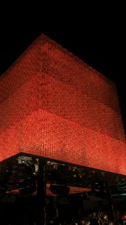 Illuminated geometric structure displays changing lights in Pecatu, Indonesia