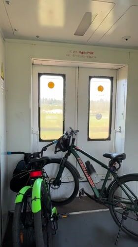 Two bicycles observed inside train car in Beloostrov, Russia