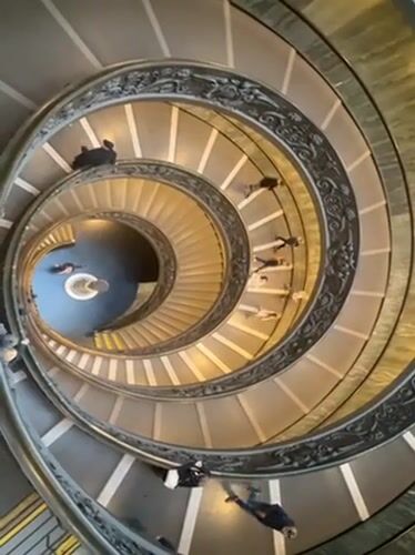 Tourist documents Vatican Museums visit with staircase photography, selfies