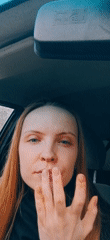 Woman photographed in car driver's seat in Chaikovsky, Russia