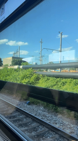 Passing through a Linz train yard, inside and out