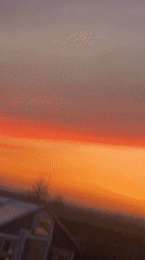 Witness captures colorful sunrise or sunset landscape scene