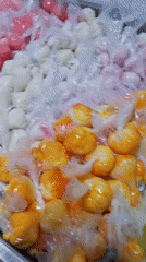 Street vendors sell colorful treats in Tinaquillo, Venezuela