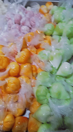 Street vendors sell colorful treats in Tinaquillo, Venezuela