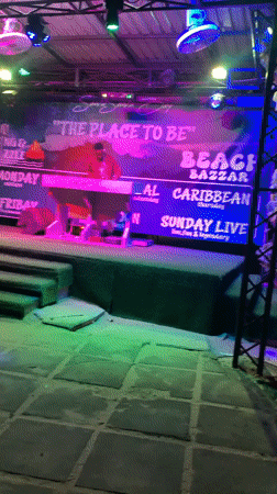 Neon-lit outdoor bar and live music night in Dar es Salaam