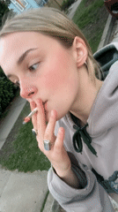 Woman smoking cigarette observed in Vancouver early morning