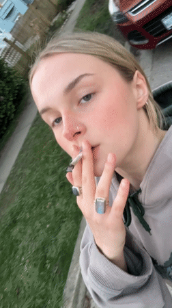 Woman smoking cigarette observed in Vancouver early morning