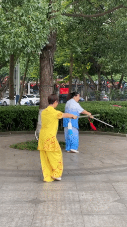 Morning martial arts and fan dancing in Jiangjin parks