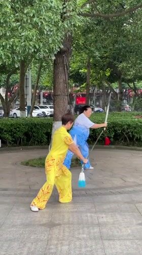 Morning martial arts and fan dancing in Jiangjin parks
