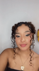 Woman photographed in multiple indoor portraits in Juan Griego