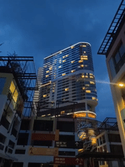 Nha Trang waterfront at dusk — lights, landmarks, and beachfront