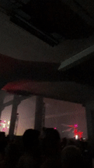 Crowd gathers at indoor venue in Belgrade for nighttime event