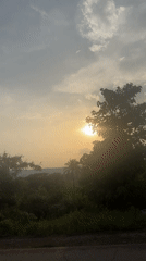 Sunset filmed over rural Umuoye, Nigeria landscape