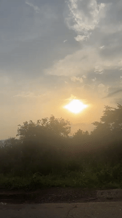 Sunset filmed over rural Umuoye, Nigeria landscape