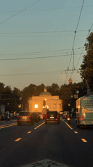Evening traffic moves through Saint Petersburg's historic streets