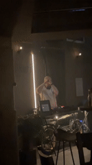 DJ performs at dimly lit bar in Stara Zagora
