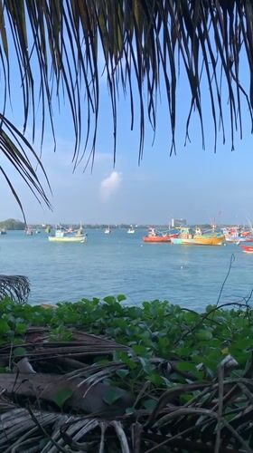 Colorful fishing boats spotted in Weligama harbor, Sri Lanka