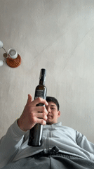 Man drinks rakia in Zlatograd home, rural scenes captured