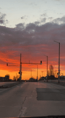 Empty Sofia road captured during dramatic sunset moment
