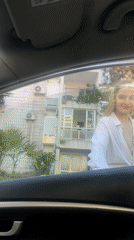 Woman documents afternoon exploring Budva, Montenegro's streets and businesses