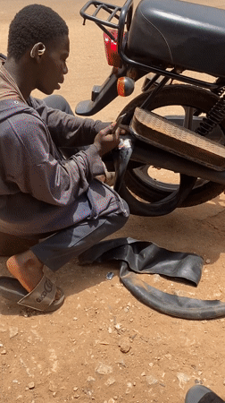 Daily life unfolds across Nigerian neighborhoods: repairs, cooking, commerce