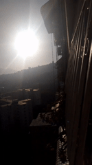 Hazy sunlight observed from Caracas balcony vantage point