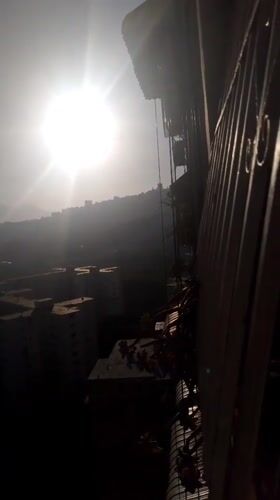 Hazy sunlight observed from Caracas balcony vantage point