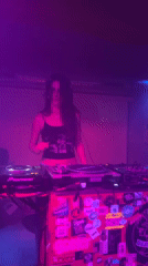 Female DJs perform at decorated booth in Pantin club