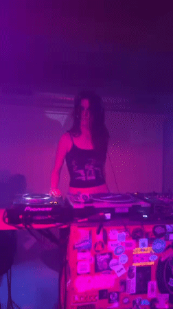 Female DJs perform at decorated booth in Pantin club