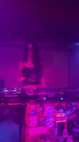 Female DJs perform at decorated booth in Pantin club