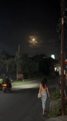 Nighttime street activity captured in North Kuta, Indonesia