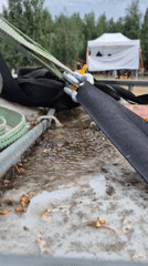 Wet trailer bed with straps and debris, Nizhnevartovsk