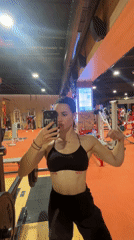Woman takes flexing selfies at Plovdiv gym