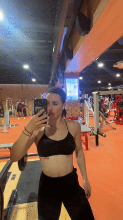 Woman takes flexing selfies at Plovdiv gym