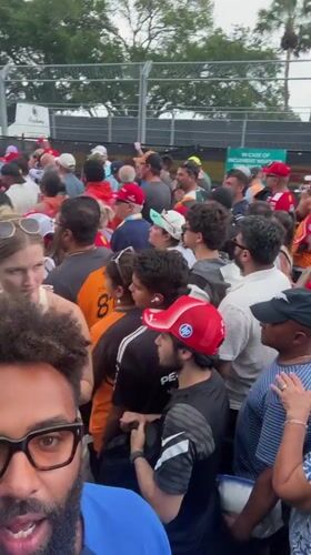 Crowd in Ferrari caps gathers at Miami Gardens venue