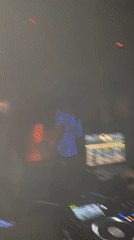 Nightclub scene captured in Krasnoyarsk with DJ and dancers