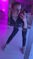 Woman takes mirror selfies in Rakovski, Bulgaria