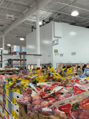 Shoppers browse merchandise at Costco warehouse store in Puebla