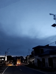 Evening street scene captured in Lhokseumawe, Indonesia