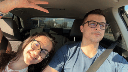 Couple spotted driving through Sofia, woman waves at camera