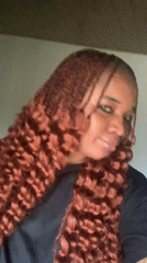Woman takes selfies at home in Nigeria