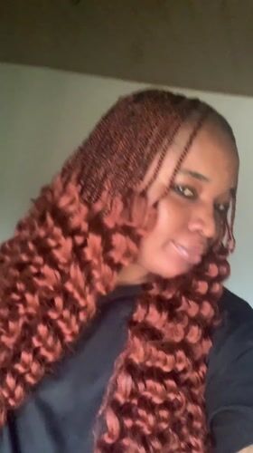 Woman takes selfies at home in Nigeria