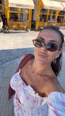 Woman takes selfies at CHIVES bakery in Bodrum Turkey
